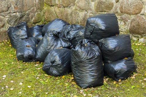 Segregated hazardous waste bags awaiting specialist collection